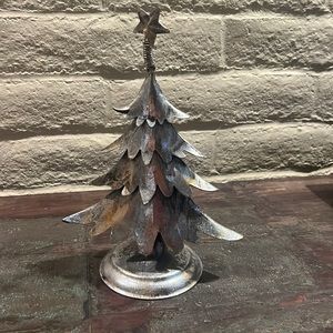 Silver metal Christmas Tree with star. Table decor. Stands about 11 inches high.